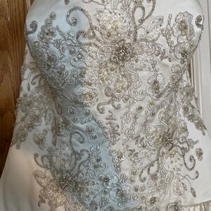 Ivory Oleg Cassini wedding dress